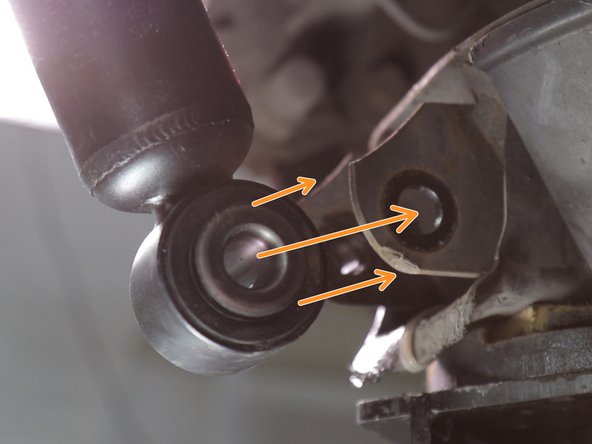 Replacer le bas dans l'amortisseur dans son logement