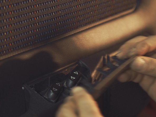 
Replace the plastic cover on the controls
