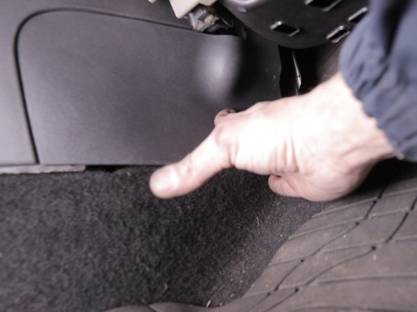 Replacer le cache plastique