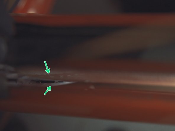 
Place the tip of the glass in the rails present in the door
