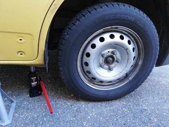 
Raise the wheel and lower the vehicle.
