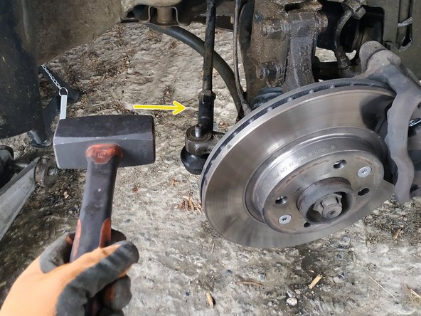 taper avec une massette sur le côté