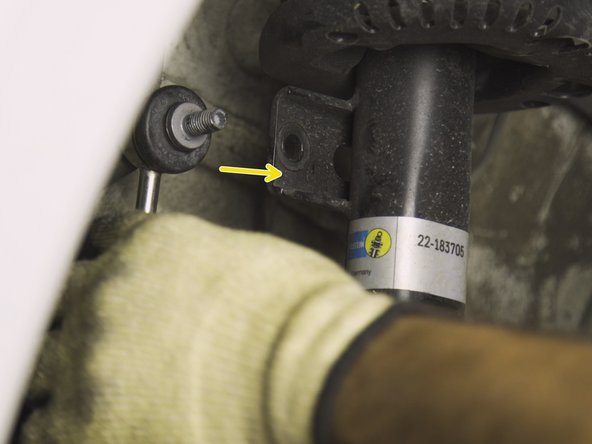 Insérer la seconde tige filetée dans l'emplacement prévu sur la jambe de force