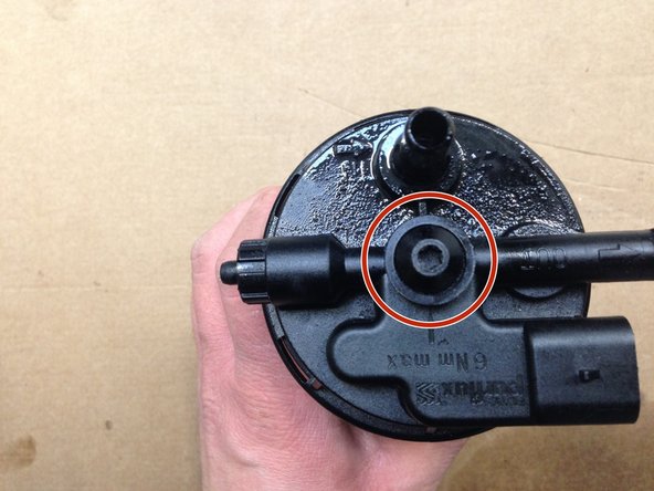 Dévisser la vis de T35