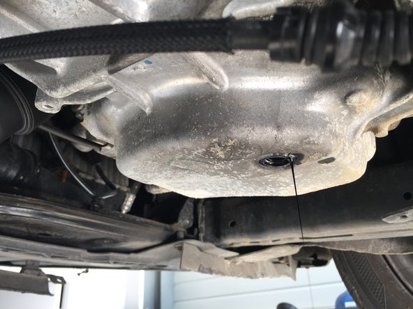 Remonter le bouchon de vidange avec le joint cuivre neuf