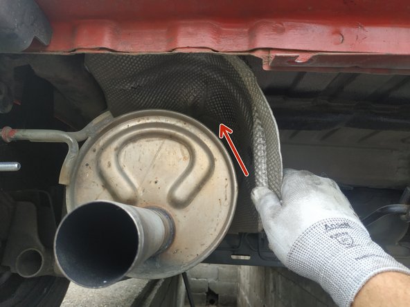 mettre la tôle pare-chaleur en place