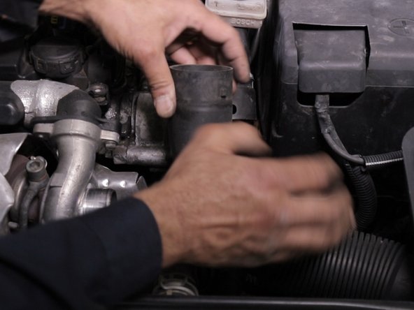 Déclipsser le manchon d’arrivée d'air