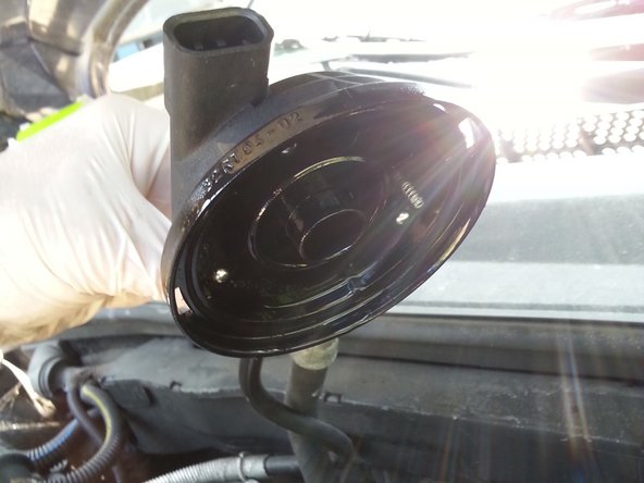 soulever le couvercle du filtre puis retirer le filtre