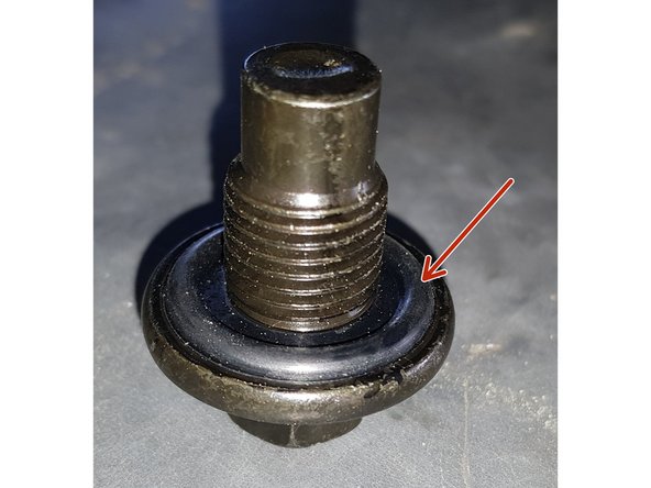 Vérifiez que le joint se trouve bien sur le bouchon puis vissez le bouchon.