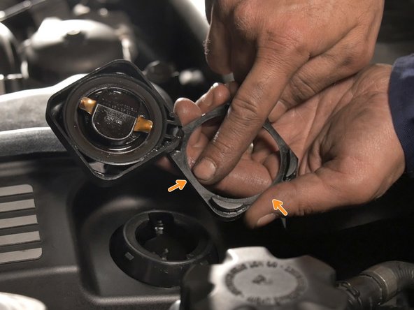 Replacer le bouchon de remplissage d'huile moteur en respectant les guides