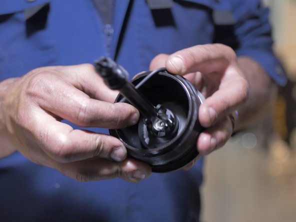 Replacer le nouveau joint sur la cloche