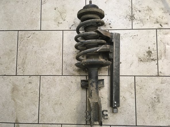 ATTENTION DE BIEN POSITIONNER L'APPAREIL POUR NE PAS QUE LE RESSORT SAUTE