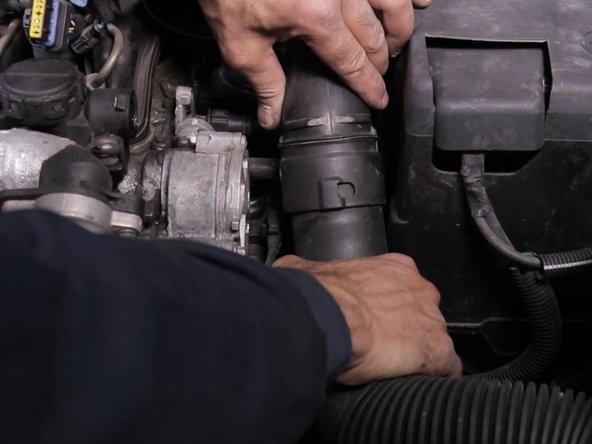 Déclipsser le manchon d’arrivée d'air