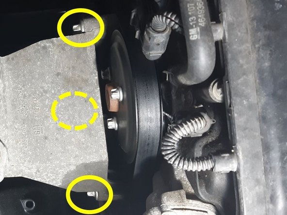 dévisser les 3 vis restante sur le support moteur (vissées dans le bloc); la vis inférieure est sous le support, voir la photo du support démonté afin de la localiser facilement (clé plate de 13); retirer le support moteur