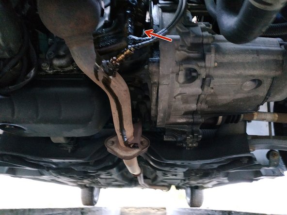 lors du démontage de la cloche de filtre à huile, de l'huile coule inexorablement