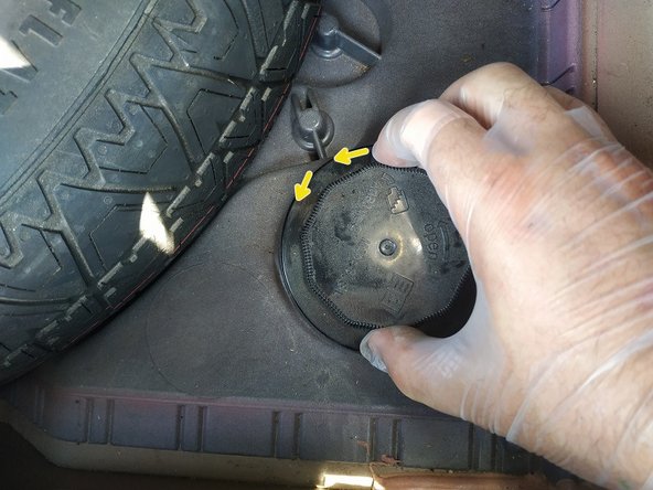 dévisser d'1/4 de tour sens antihoraire