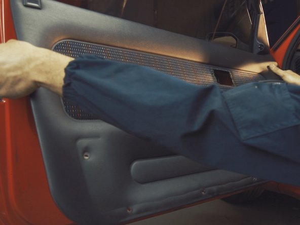 
Pull the bottom of the door panel to unclip it from the door
