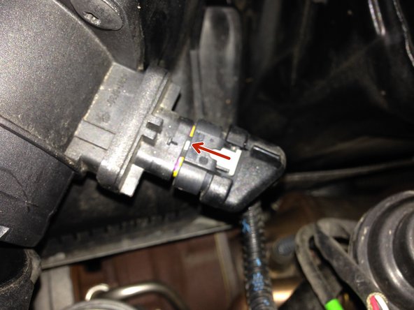 Puis verrouiller le en poussant la patte blanche pour verrouiller le système