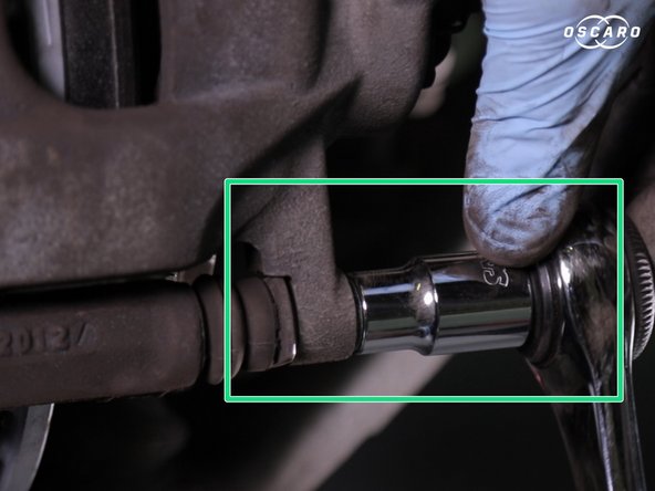 Faire basculer l’étrier et resserrer la vis du bas