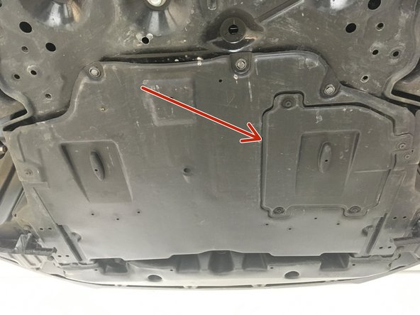 Retirer la partie de la plaque sous moteur