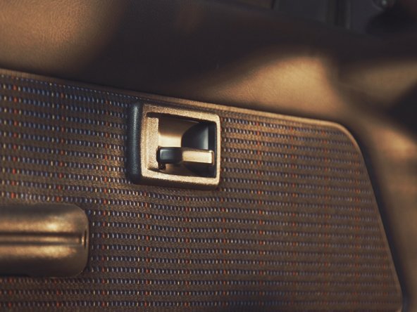 
The thicker side towards the armrest
