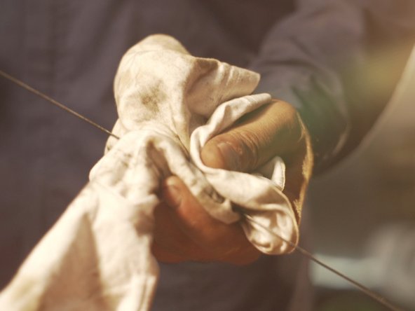 
Pull out the oil level dipstick and wipe off the old level
