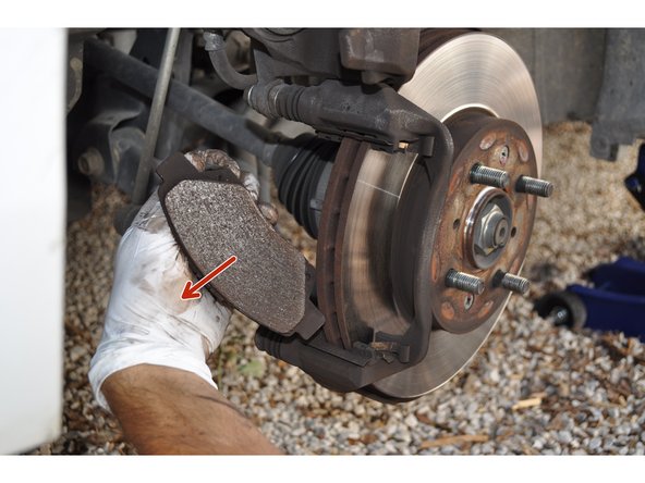 
Remove the brake pads.
