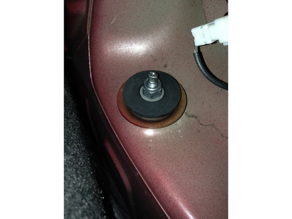 Replacer le tapis de coffre