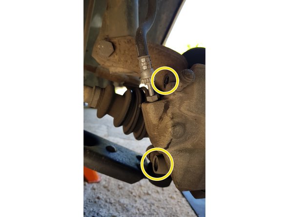 Une fois les capuchons retirés vous avez accès aux 2 vis.