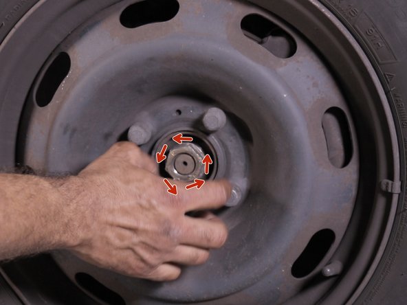 Dévisser l’écrou de cardan à la main et retirer le