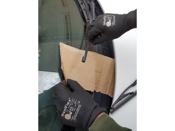 Reposer le bras sur le carton