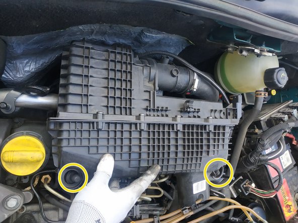 mettre la boîte à air en place et appuyer