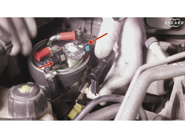 Rebrancher les 2 durites  (en les enfonçant jusqu'au &quot;clic&quot; de verrouillage).