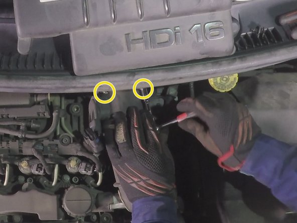 Deviser les deux vis du débitmètre