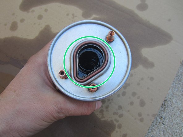 Positionner le joint neuf sur le filtre