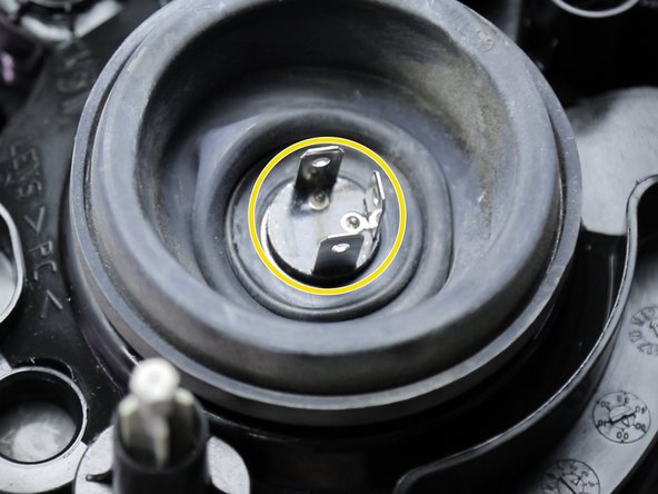 Enfoncer le centre du joint jusqu'à l'ampoule