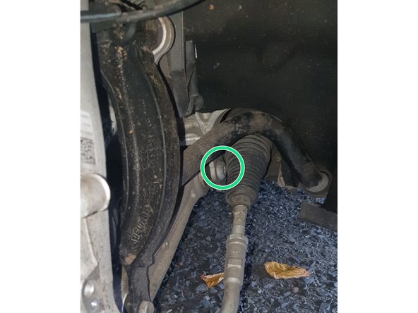 desserrer le pied d'amortisseur avec deux clés plates de 16.