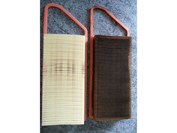 Placer le nouveau filtre à air dans la boîte à air