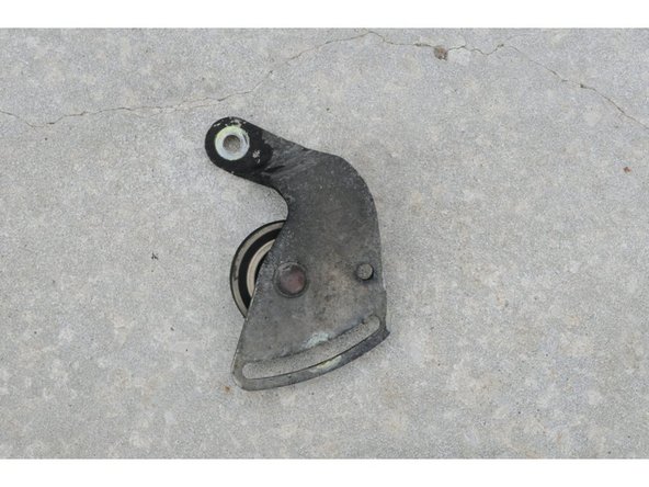 
Check that the roller is rotating properly and coat the bearing seal with engine oil while rotating the roller. If you feel any defect in the bearing, then the entire roller should be replaced.
