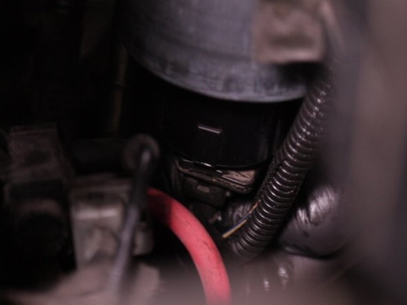 Replacer le capteur sous le nouveau filtre