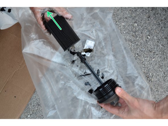 Tirer sur la cartouche usagée pour la retirer de la cloche.