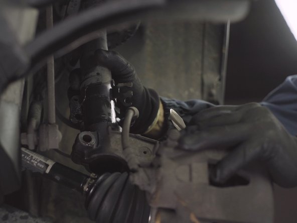 Sortir l'amortisseur de son emplacement