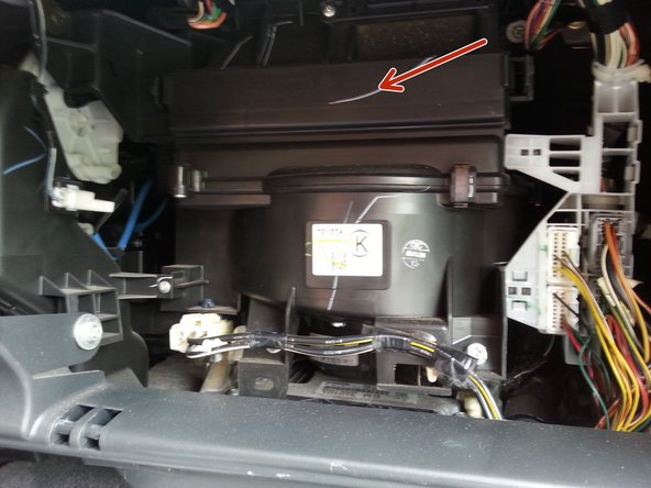 Repositionner le cache en plastique