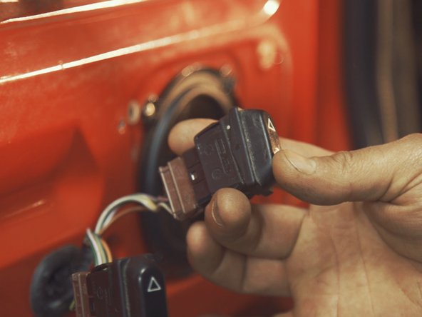 
Reconnect the window lifter control to be able to raise and lower the window as needed
