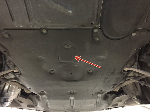 Ouvrir la trappe pour accéder au bouchon