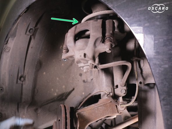 Accrocher l’étrier de frein au ressort d'amortisseur