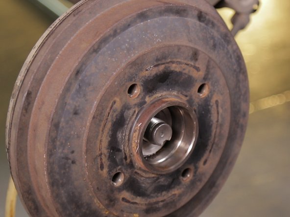 Replacer la coupelle dans le tambour, sur la fusée