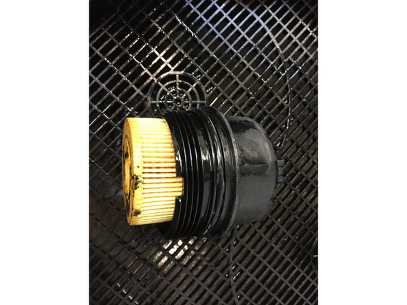 Monter la nouvelle cartouche du filtre en la clipsant