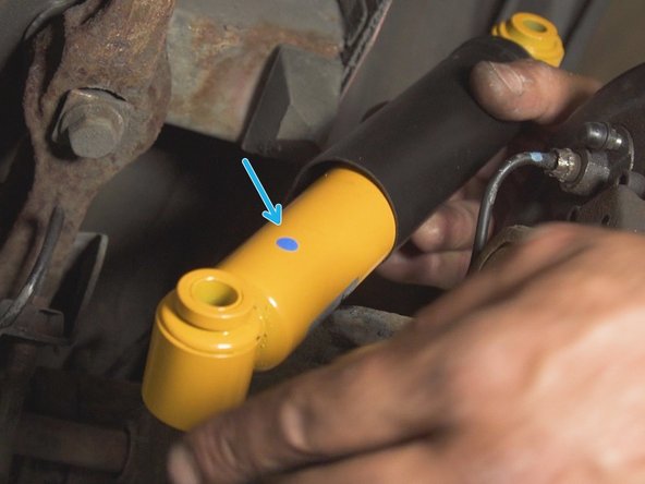 
If the shock absorber is marked with a blue dot, it indicates the bottom of the shock absorber
