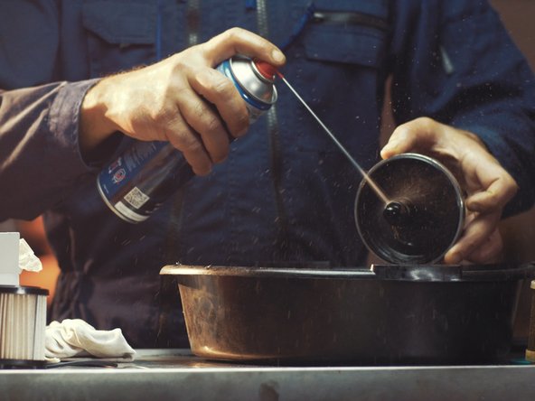
Clean the tank cover with brake cleaner and a cloth
